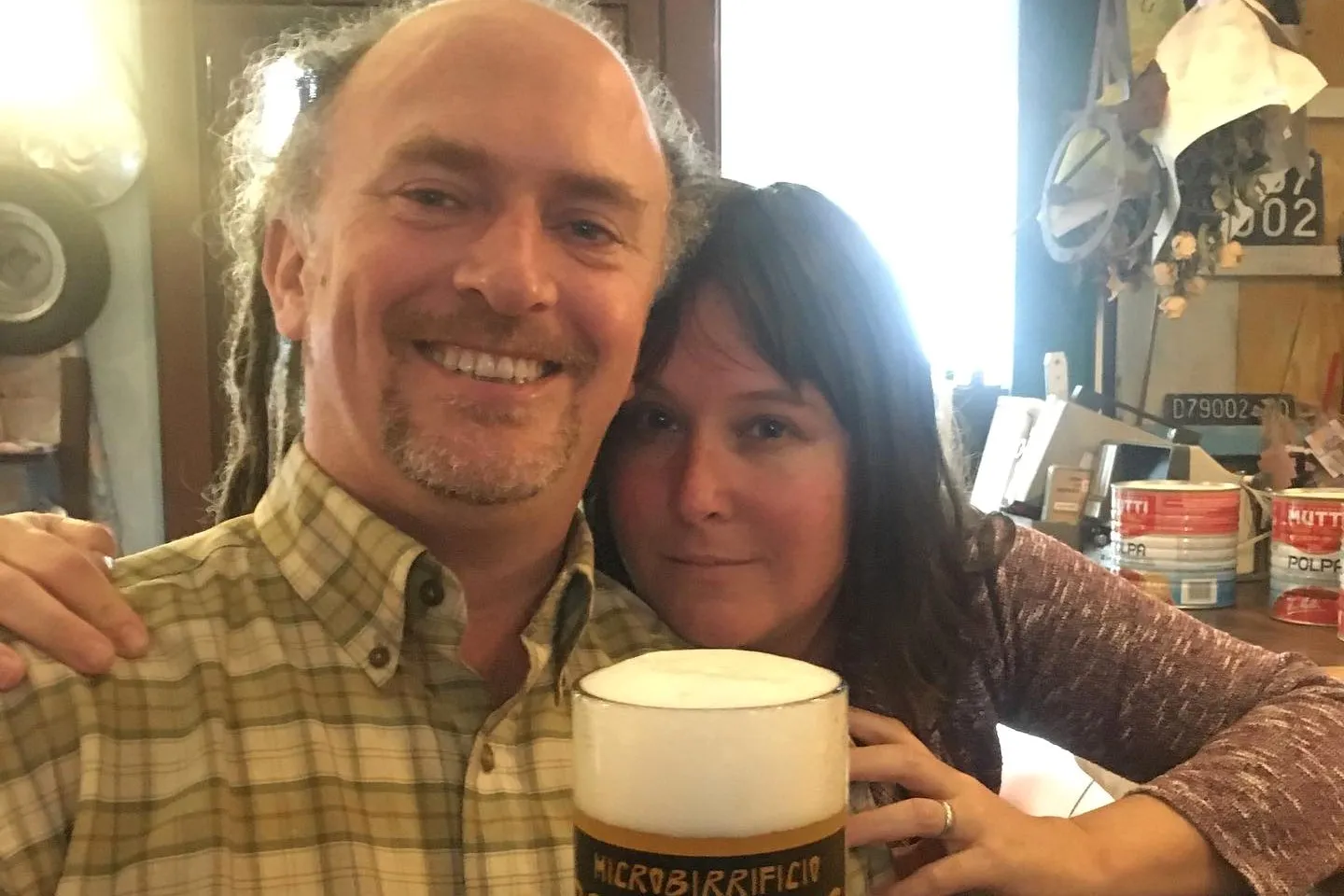 Daniel Satterthwaite and Sarah Ferguson with a beer